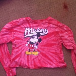 This is a Mickey Mouse Disney long sleeve top.